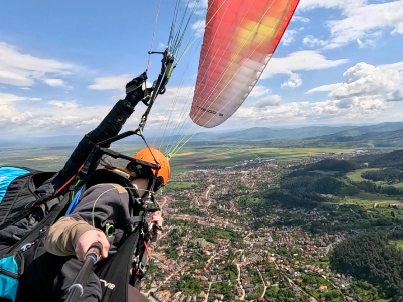 Tandem paragliding from Bunloc above Brasov in summer